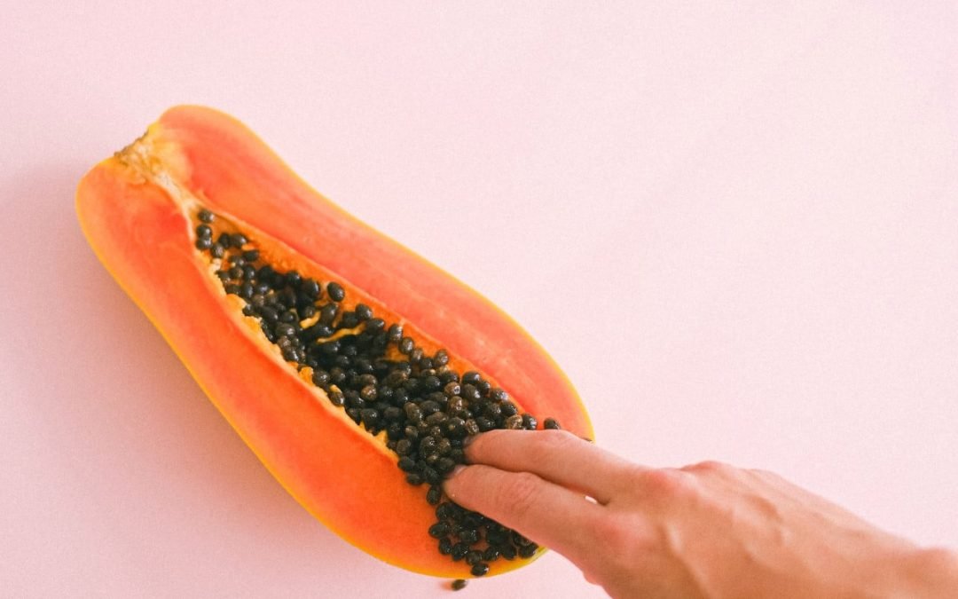 Papaya with Seeds representing Vagina, Man Fingering for Sexual Pleasure